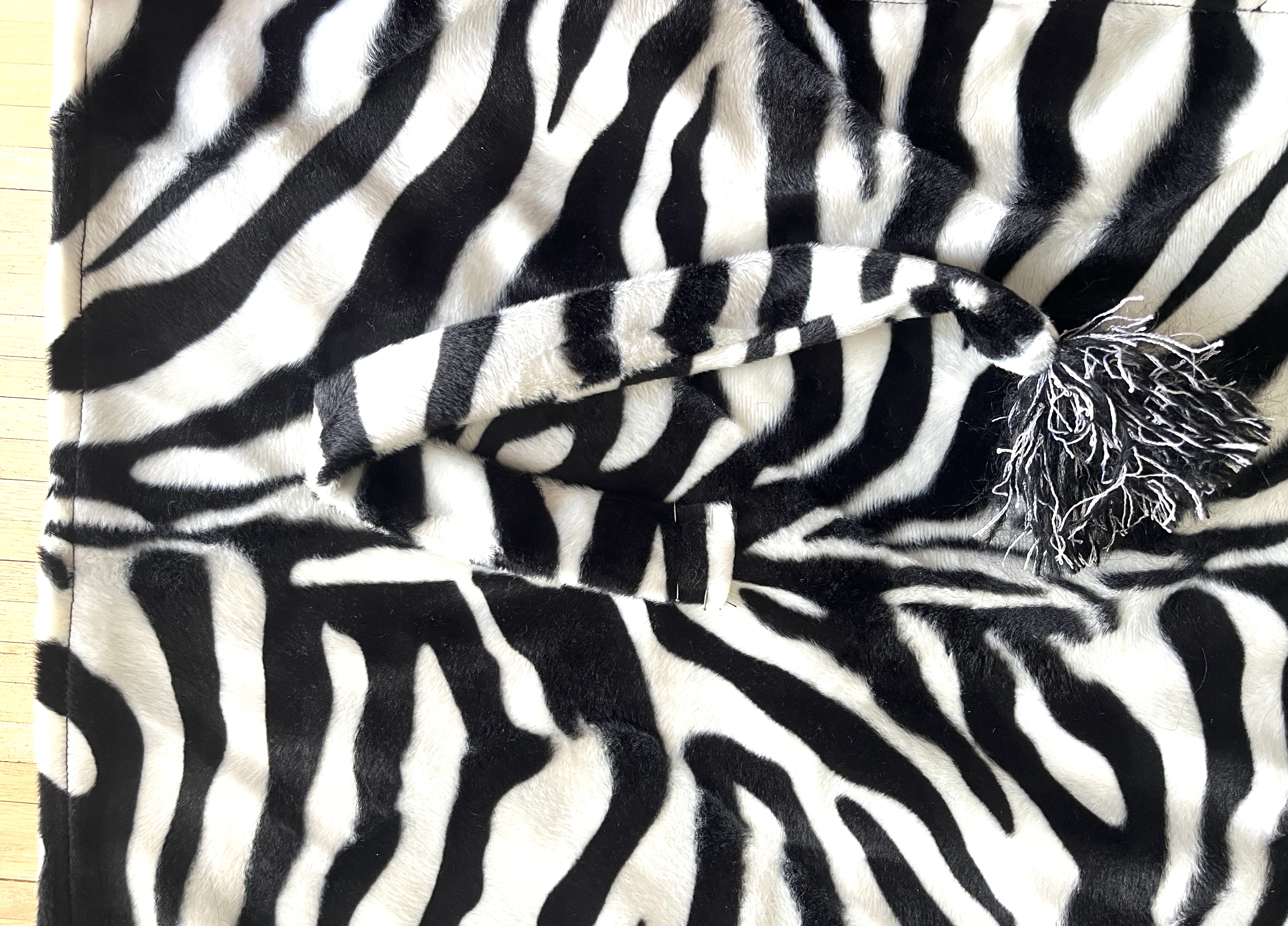 Fixation de la queue